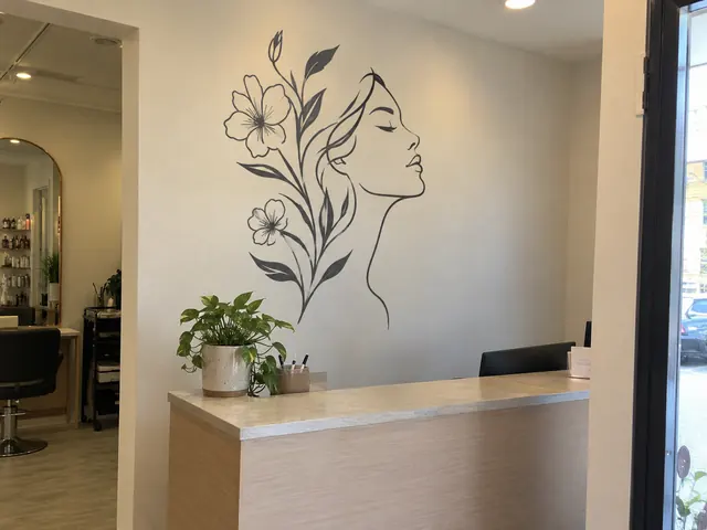 AI-generated mockup: Botanical vinyl wall decal in a beauty salon
